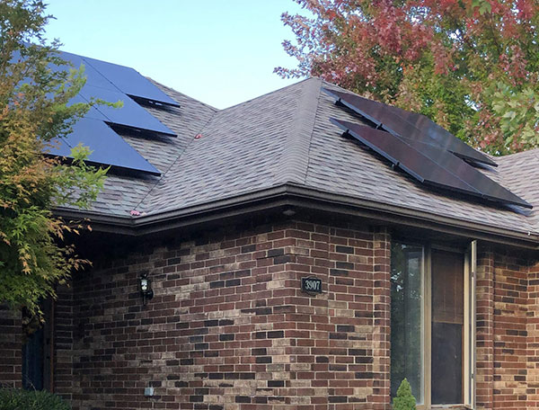 Solar Panels on the roof of traditional brick home